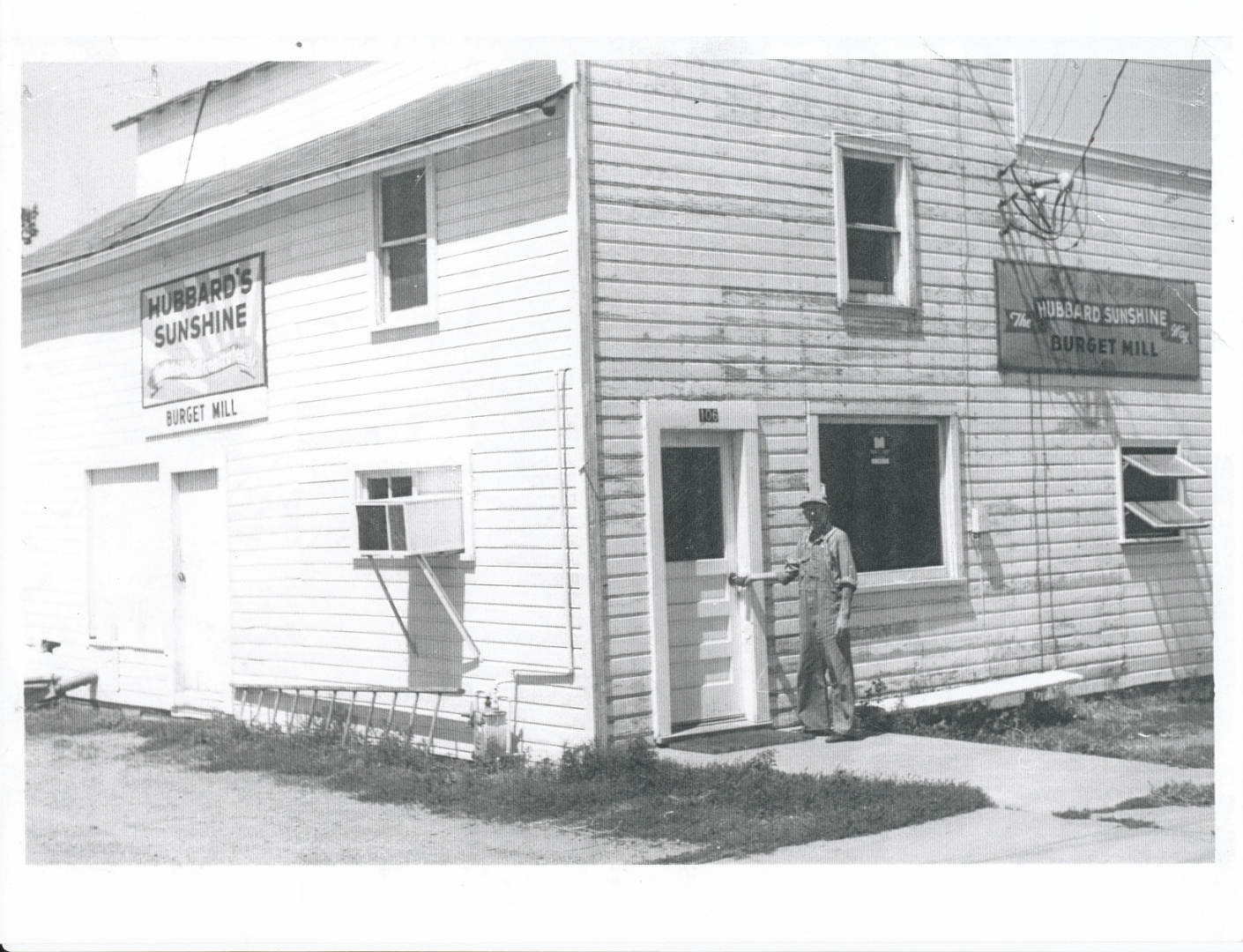 Burget Mill in 1959 with Hubbard's Sunshine feed signs