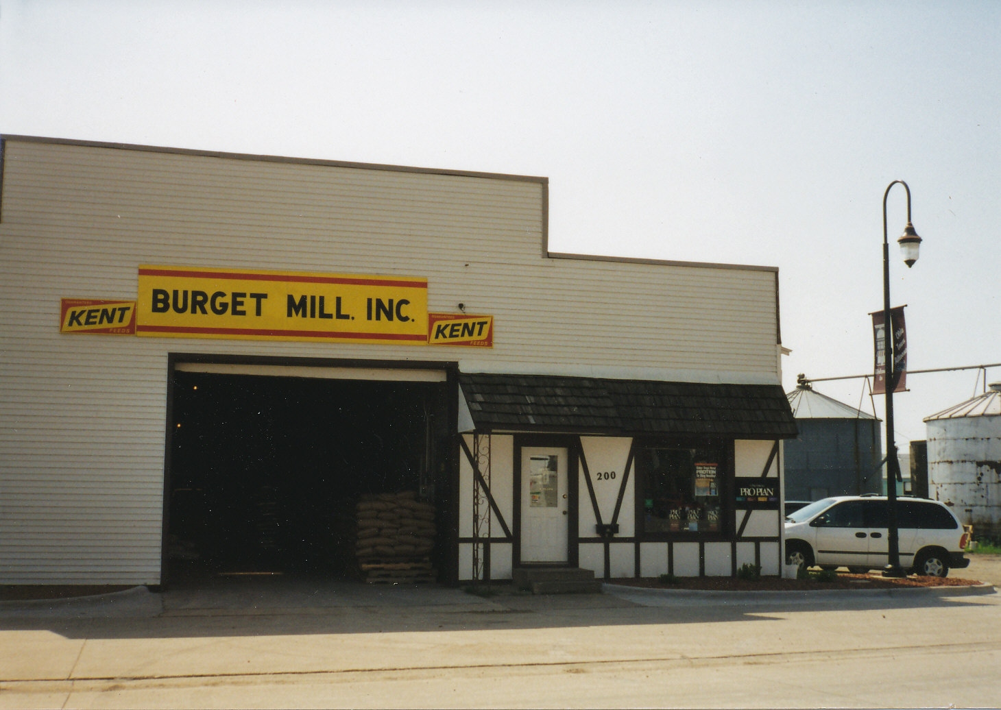 Burget Mill Inc. storefront in 1998 with Kent Feeds signage