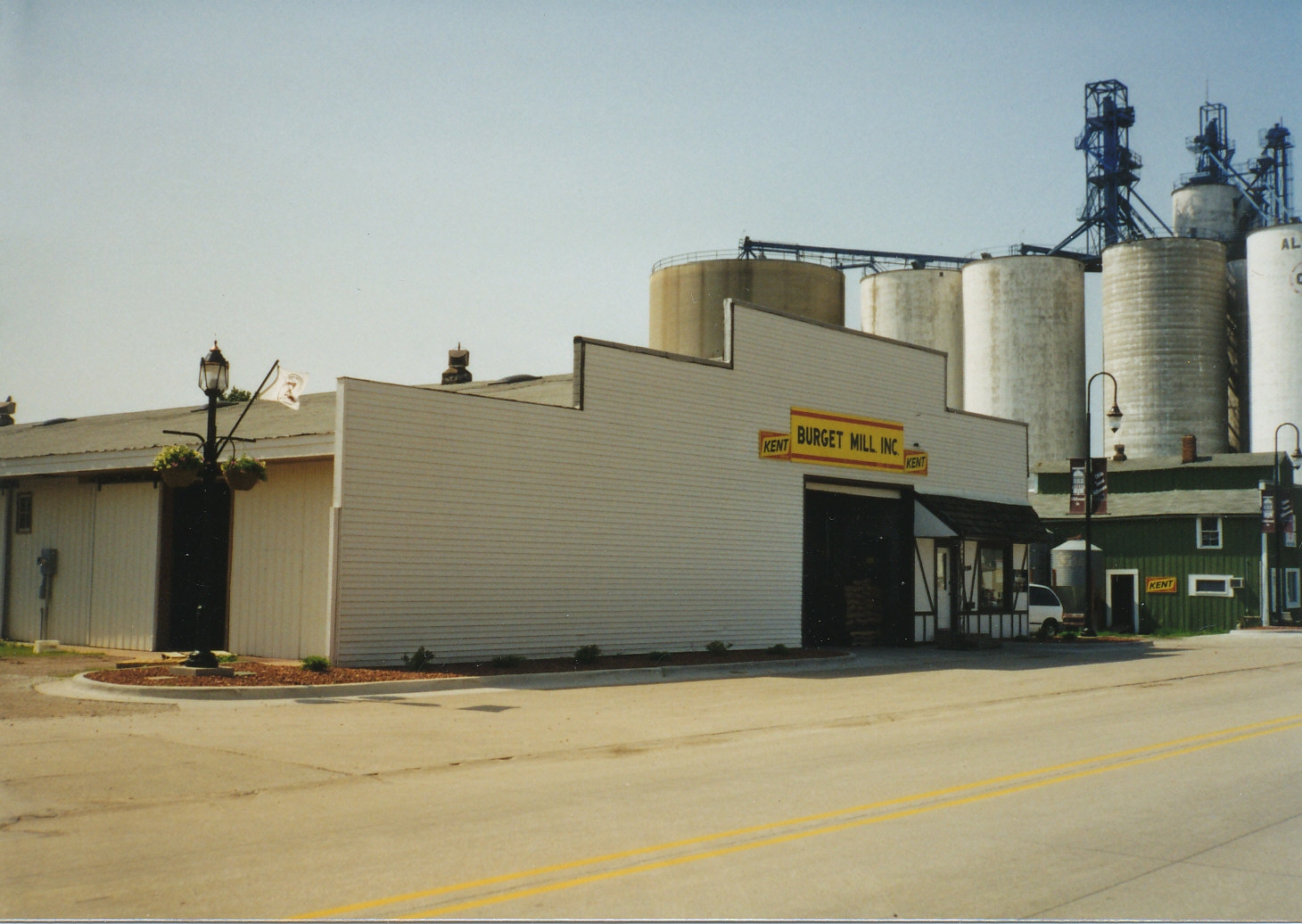 Wide view of Burget Mill property in 1998 showing the full facility with grain silos